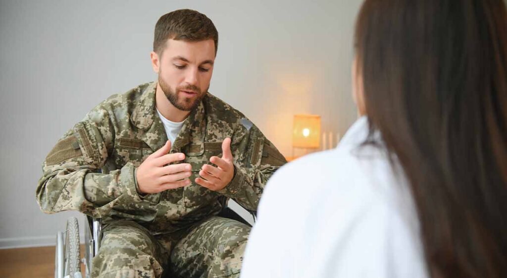A soldier visiting a psychologist represents the importance of seeking support.