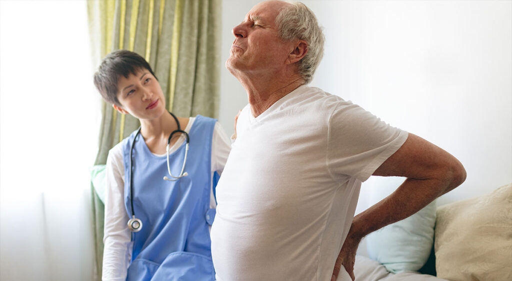Photos of a man with lumbosacral strain visually support the "Understanding Lumbosacral Strain" article by illustrating common symptoms like pain, stiffness, and limited movement, helping readers better relate to and understand the condition.